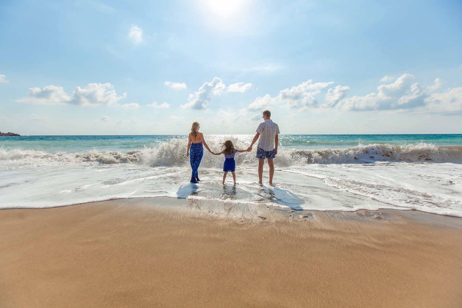 negative space family at the beach